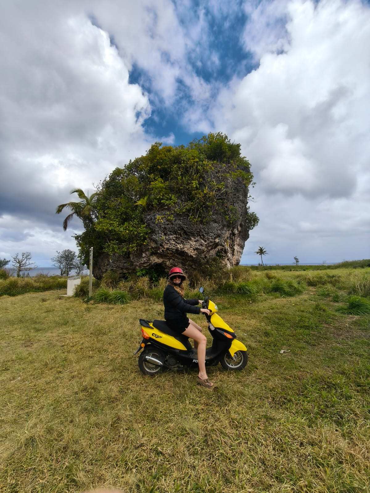 Scooter at rock formation